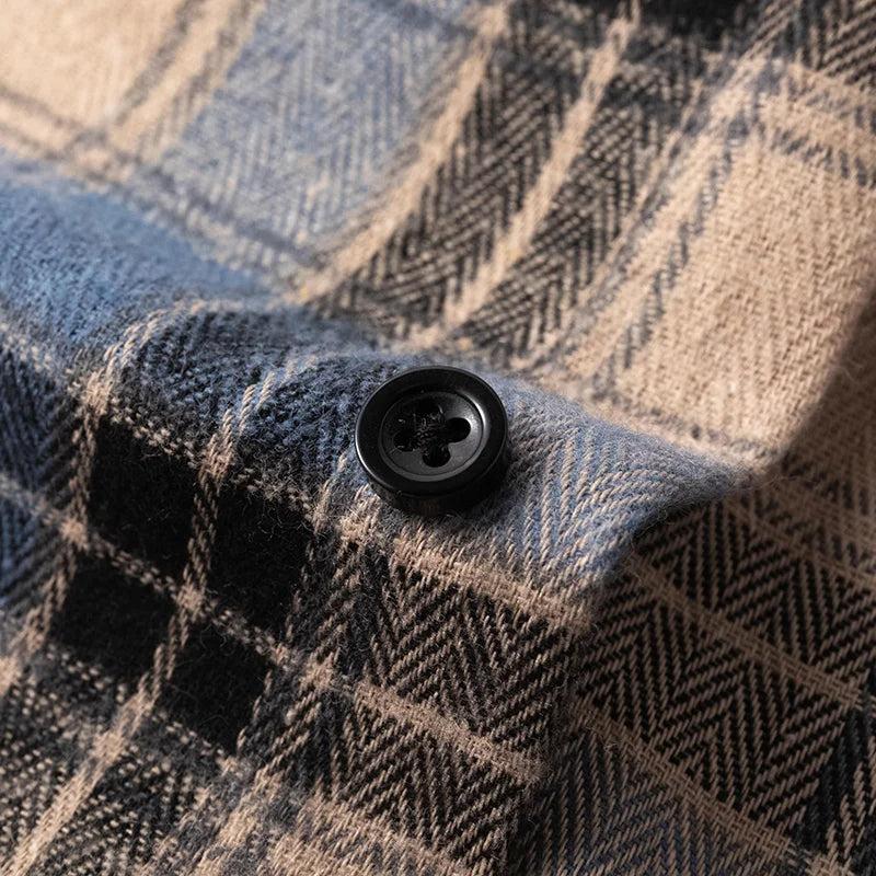 Men's casual long sleeve plaid flannel shirt featuring a classic check pattern. Great for everyday wear.