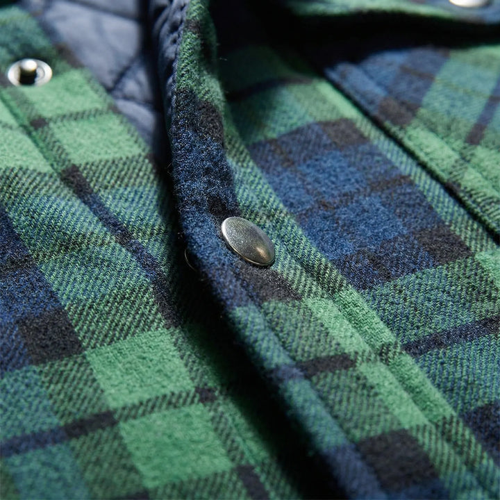 Durable men's plaid shacket, classic button-up lumberjack jacket style.