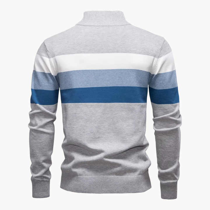 Men's striped quarter-zip sweater, a staple for comfortable, classic, everyday style.