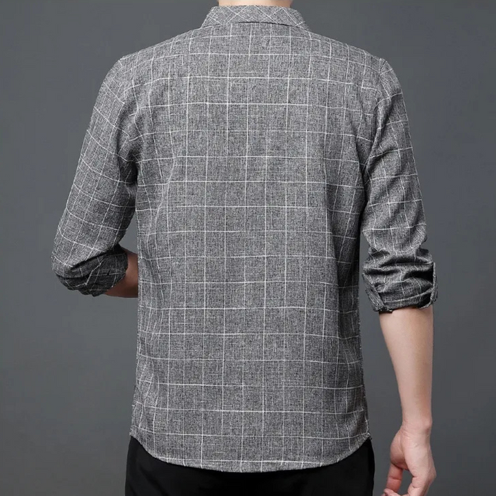 Versatile men's plaid shirt, button-up, long sleeve. A timeless fashion staple for any casual or smart outfit.