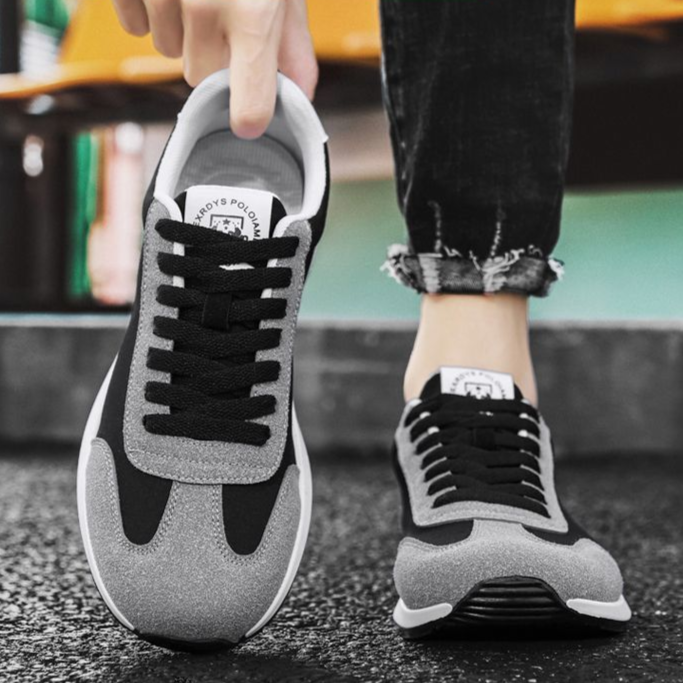 Men's classic retro comfort sneakers worn casually, emphasizing comfort, style, and versatility.