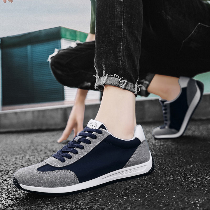 Men's retro comfort sneakers in a lifestyle setting, perfect for casual outings & versatile style.
