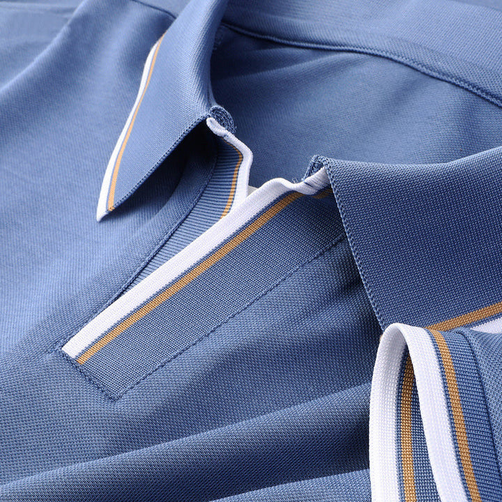 Men's classic short sleeve polo shirt with stylish contrast trim, perfect for casual or semi-formal everyday wear.
