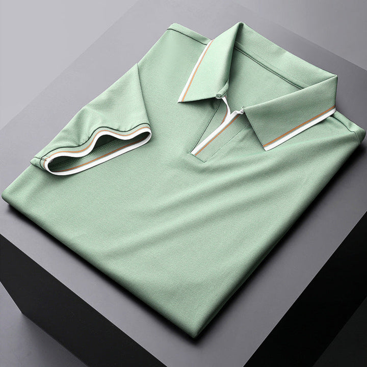Stylish men's collared polo shirt, classic short sleeve design with elegant contrast trim for any occasion.