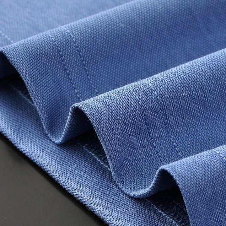 Timeless men's short sleeve polo shirt, classic design with subtle contrast trim detail for sophisticated style.
