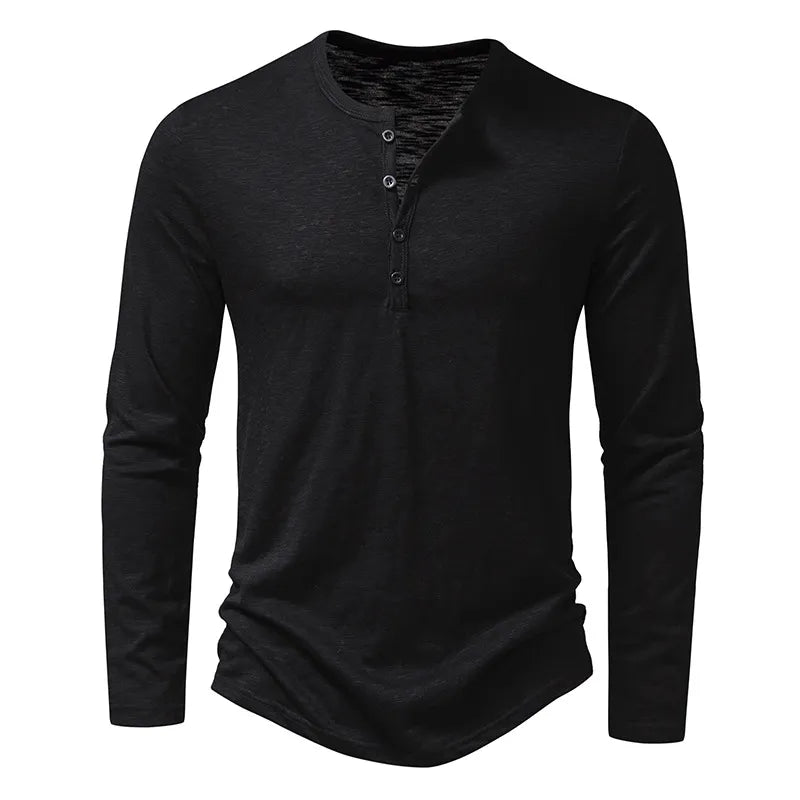Close-up of men's classic slim fit henley shirt fabric & button detail, long sleeve casual top.