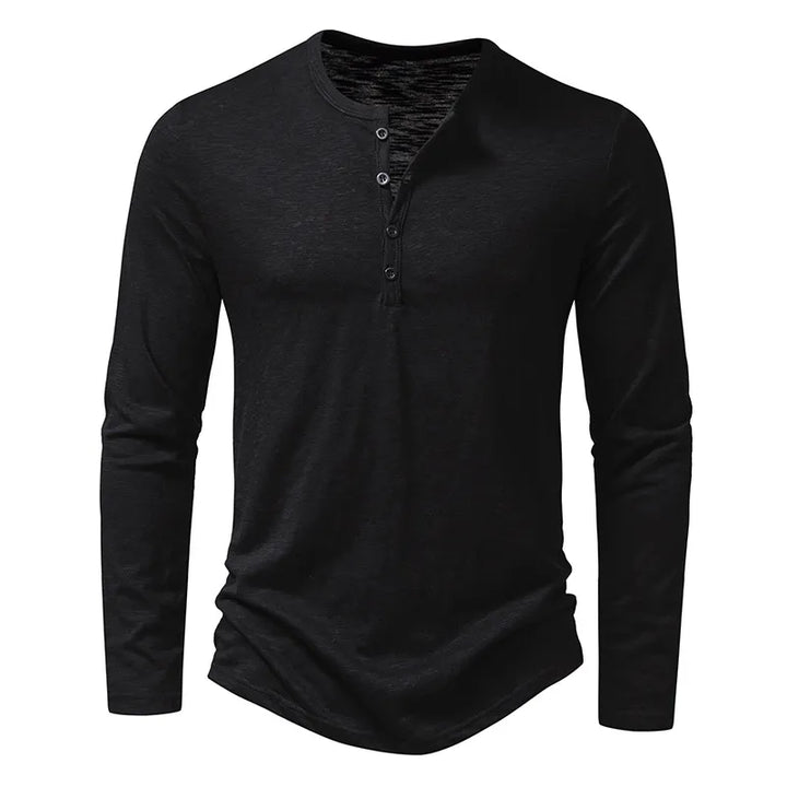 Close-up of men's classic slim fit henley shirt fabric & button detail, long sleeve casual top.