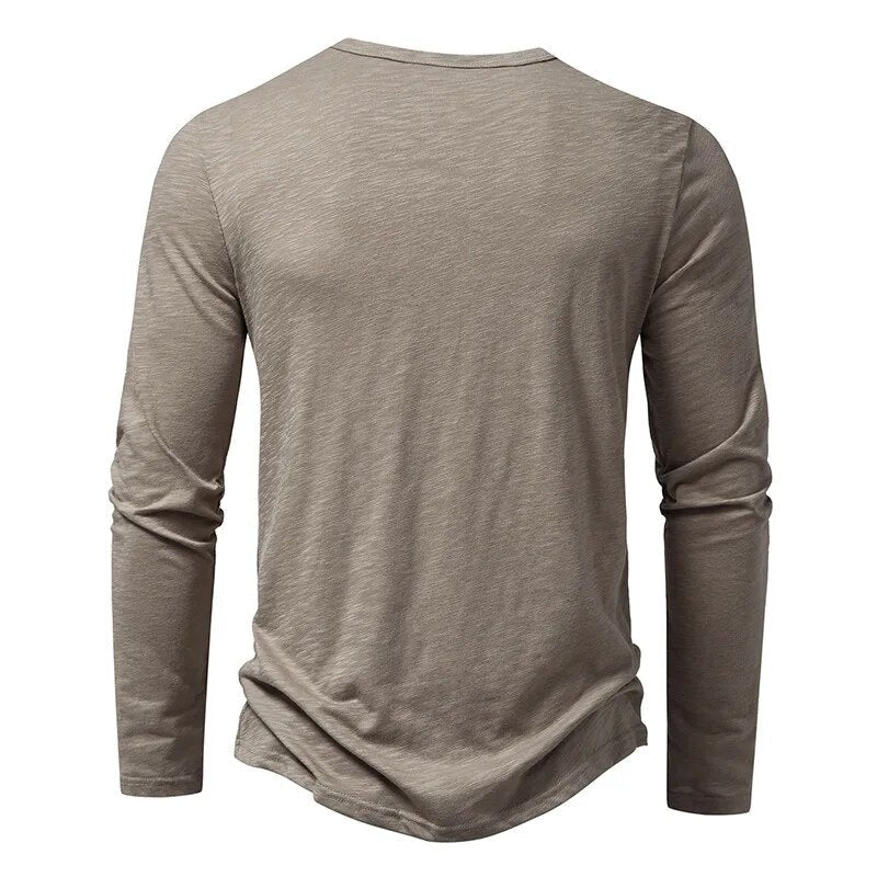 Comfortable men's long sleeve henley shirt in a slim fit, perfect for versatile everyday casual wear.