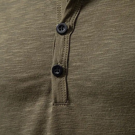 Navy blue men's classic slim fit long sleeve henley shirt, versatile & comfortable for casual outfits.