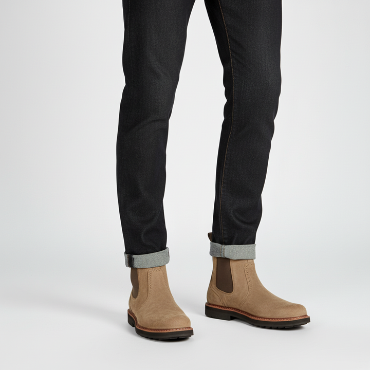 Stylish men's Chelsea boots, slip-on design in black, suitable for dressy or casual men's fashion.