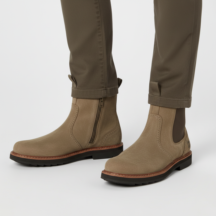 Classic men's black slip-on Chelsea boots, durable faux leather, essential for men's winter fashion.