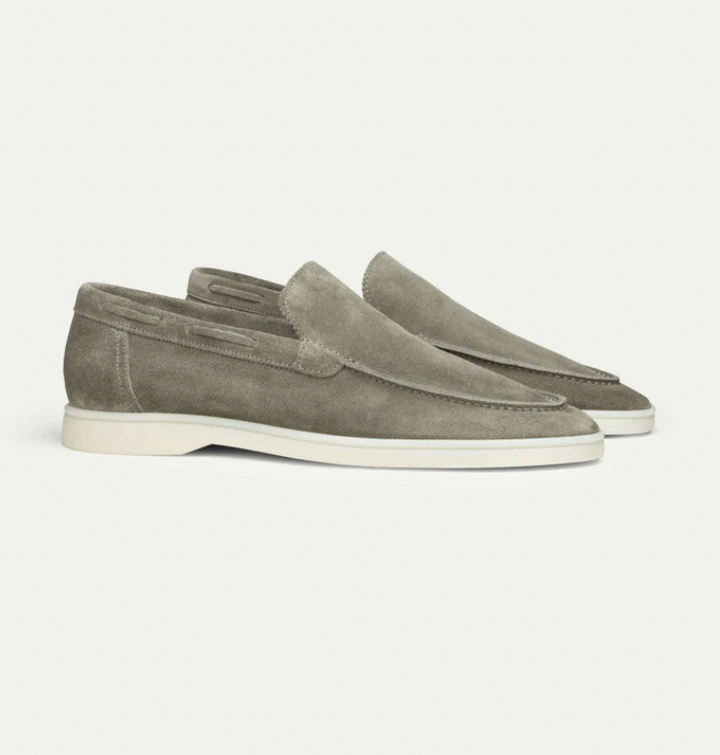 Stylish men's slip-on loafers, versatile for casual or formal wear, offering everyday comfort.
