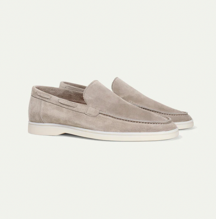 Sophisticated men's dress loafers in high-quality leather, perfect slip-on shoes for formal or casual.