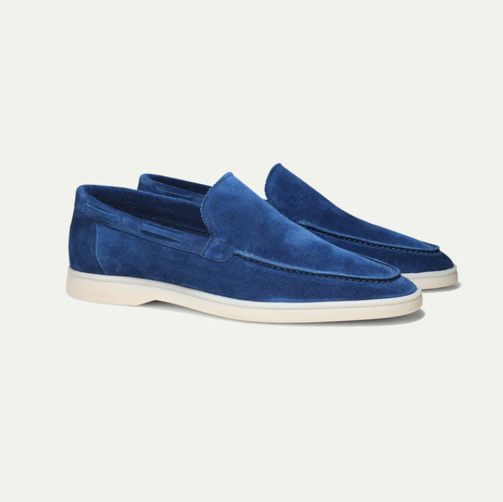 Side profile of stylish men's leather slip-on loafers, showcasing elegant design for any outfit.
