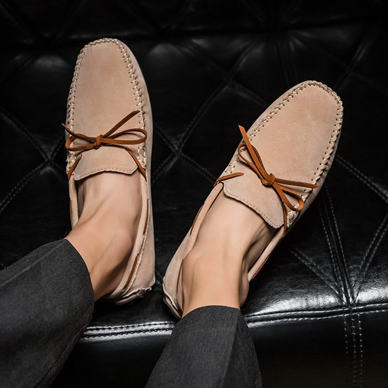 Classic slip-on loafers for men, offering easy wear and comfort. Essential men's fashion footwear.
