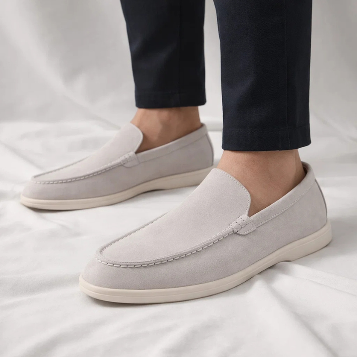 Dark men's classic loafers. Comfortable slip-on shoes for versatile casual & formal wear.