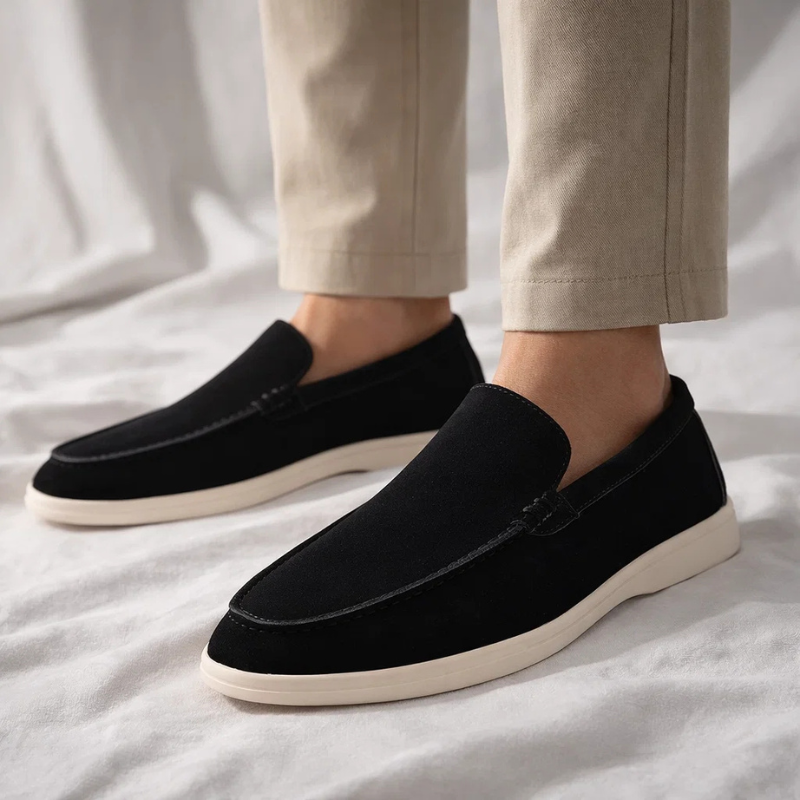 Close-up of men's classic loafers, highlighting quality & comfortable design. Stylish slip-on shoes.