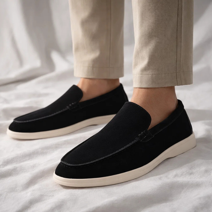Close-up of men's classic loafers, highlighting quality & comfortable design. Stylish slip-on shoes.