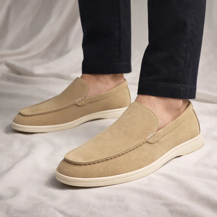 Side view of men's classic loafers. Versatile slip-on shoes for comfortable everyday style.