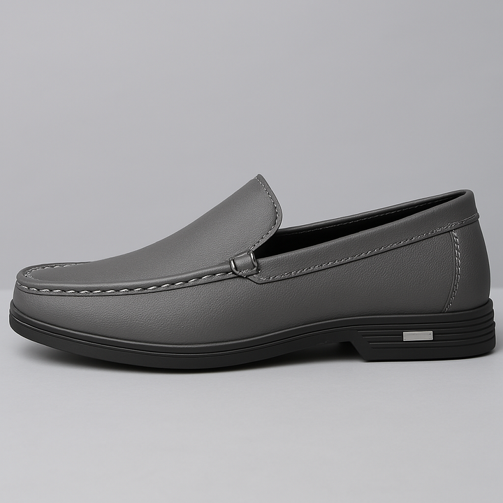 Men's comfort slip-on loafers, offering durable support and stylish appeal for all-day wear. Essential footwear.