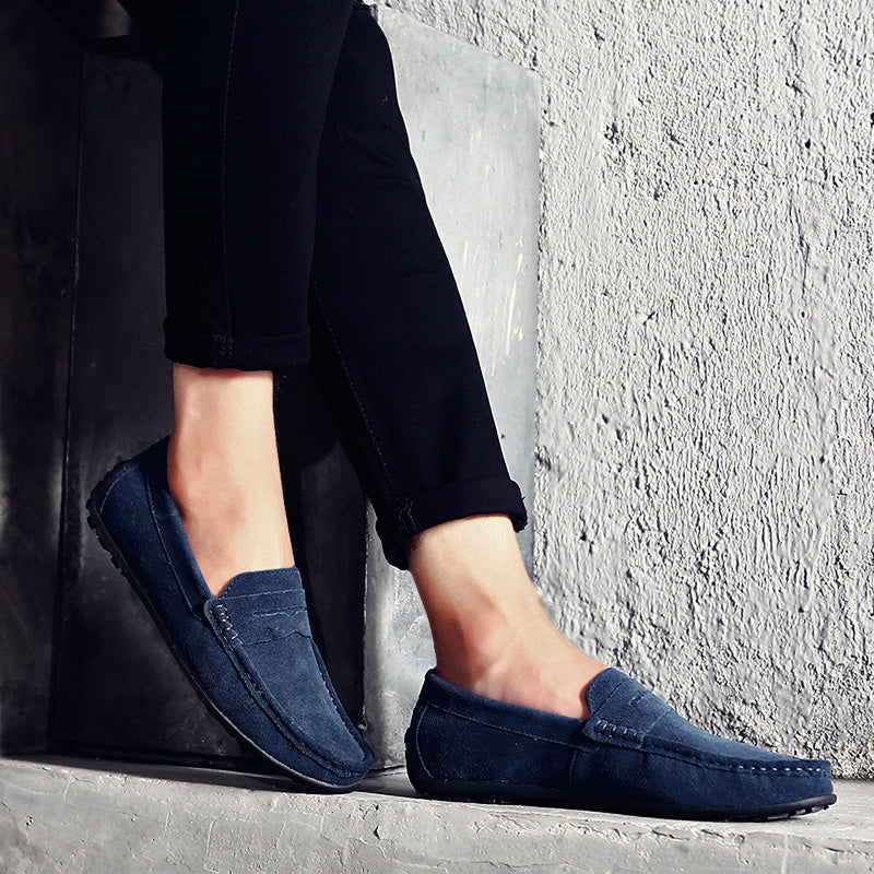 Side profile of comfortable men's slip-on loafers, classic design for versatile everyday footwear.