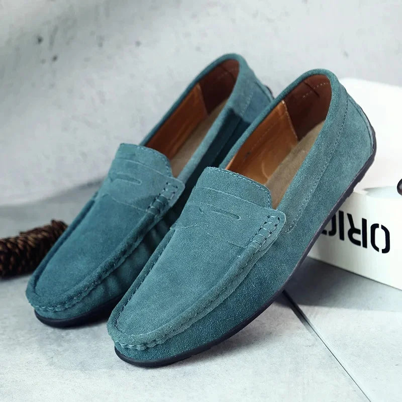 Top view of men's stylish slip-on loafers, excellent for business casual or comfortable daily wear.
