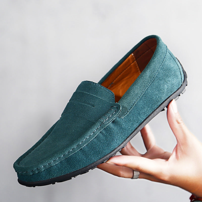 Pair of men's classic slip-on loafers, offering all-day comfort and timeless, versatile style.