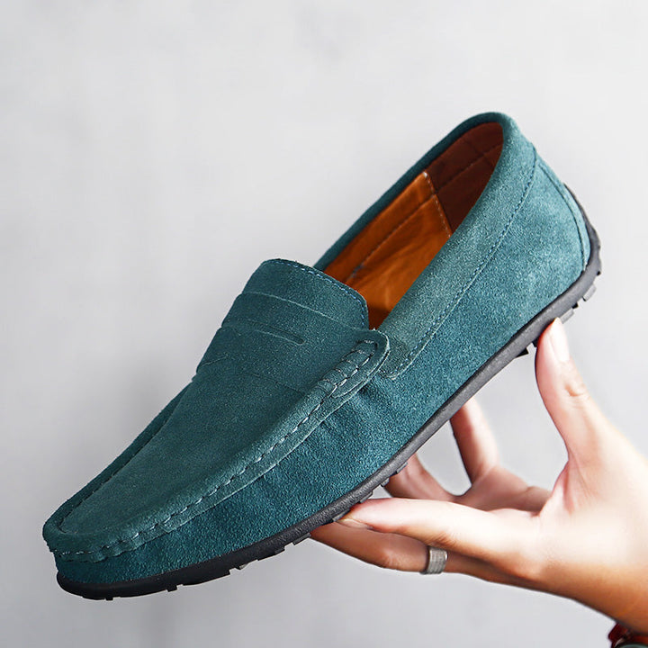 Pair of men's classic slip-on loafers, offering all-day comfort and timeless, versatile style.
