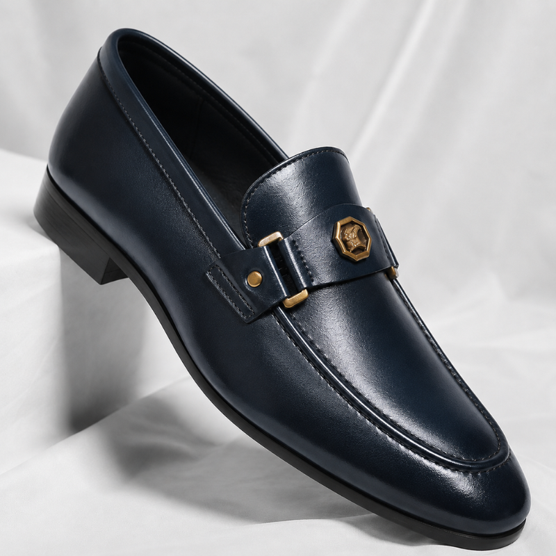 Men's classic slip-on loafers with polished metal detail, ideal for sleek casual or dress wear.