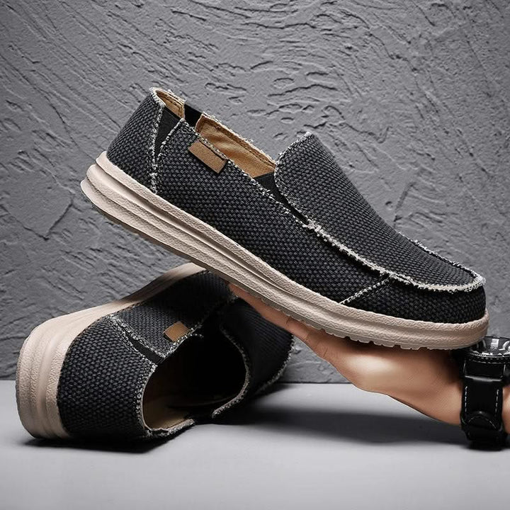 Comfortable men's slip-on loafers, classic mariner style. Lightweight, durable, easy-wear casual footwear.