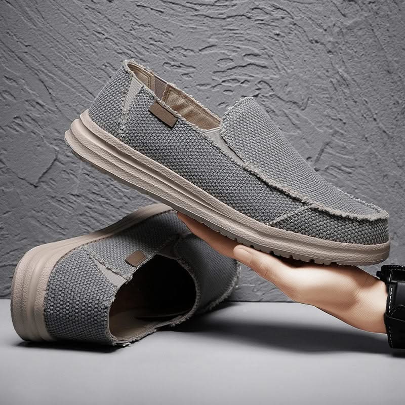 Mariner style men's slip-on loafers in black. Classic, comfortable, and durable casual footwear.