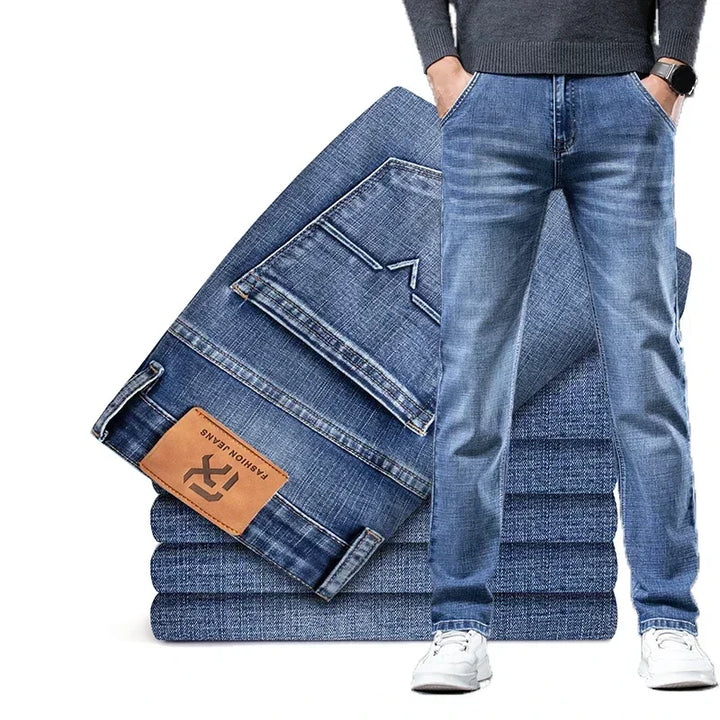 Men's classic straight fit blue denim jeans. Essential everyday comfort jeans with a modern fit.