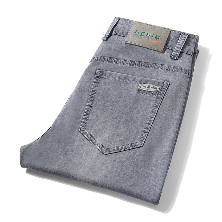 Classic straight fit denim jeans for men. Comfortable, versatile, and a perfect choice for everyday casual style.