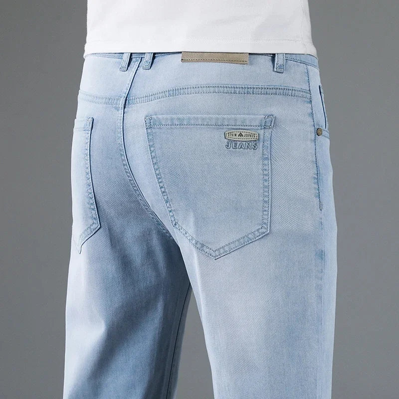 Straight fit men's denim jeans, offering a classic and comfortable style for daily fashion and versatility.