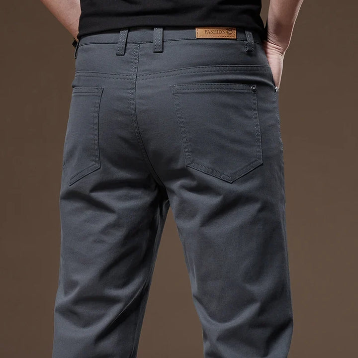Men's classic straight-leg tailored pants for a timeless, sophisticated look. Versatile everyday wear.