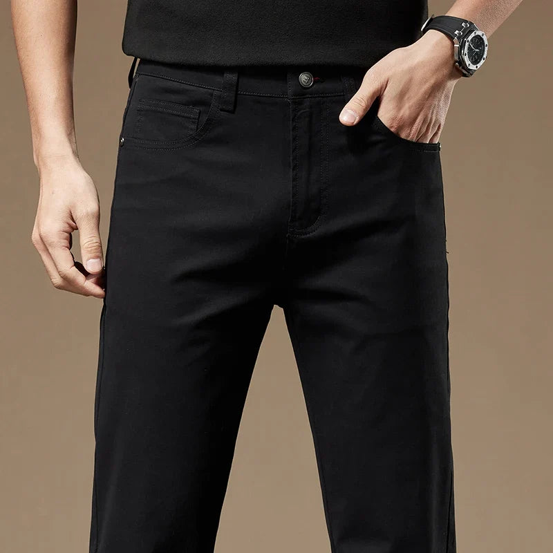 Modern men's tailored straight-leg pants, versatile for smart casual events and everyday comfort.