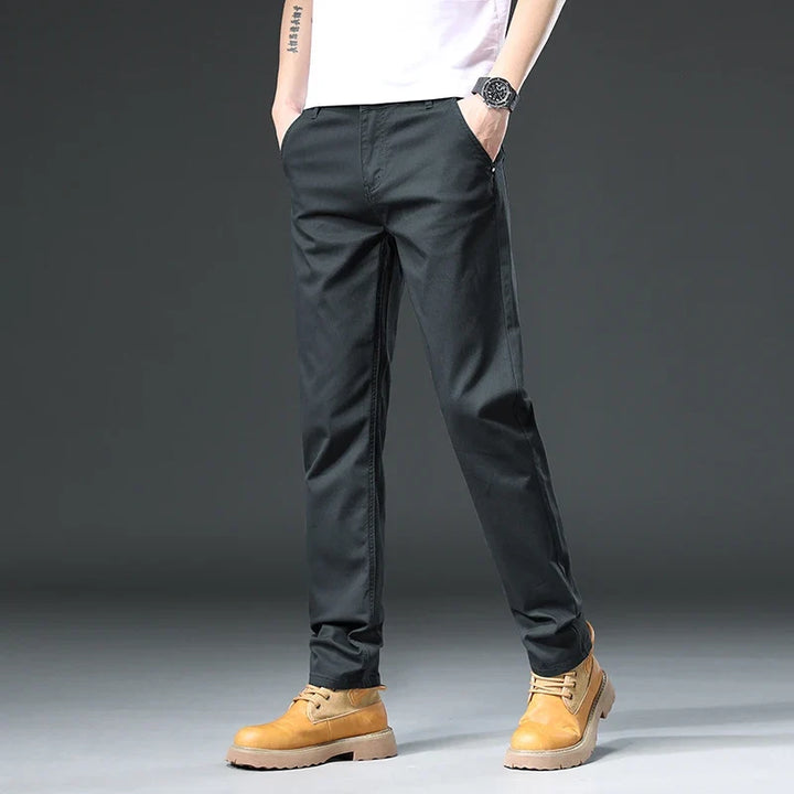 Black men's classic stretch fit pants, ideal for workwear, casual outings, flexible fit & all-day comfort.