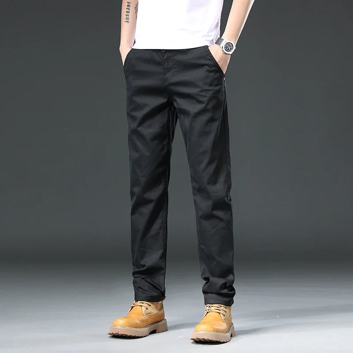 Men's everyday classic fit stretch pants, available in gray, black, khaki for versatile styling & comfort.