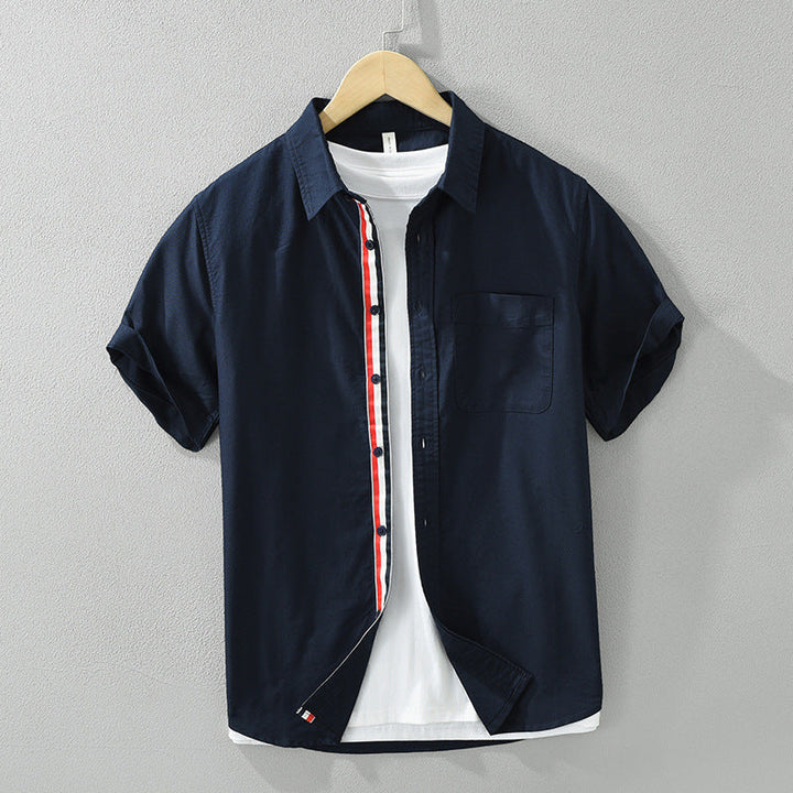 Collared men's striped summer shirt with short sleeves, offering a classic and lightweight look for warm weather.