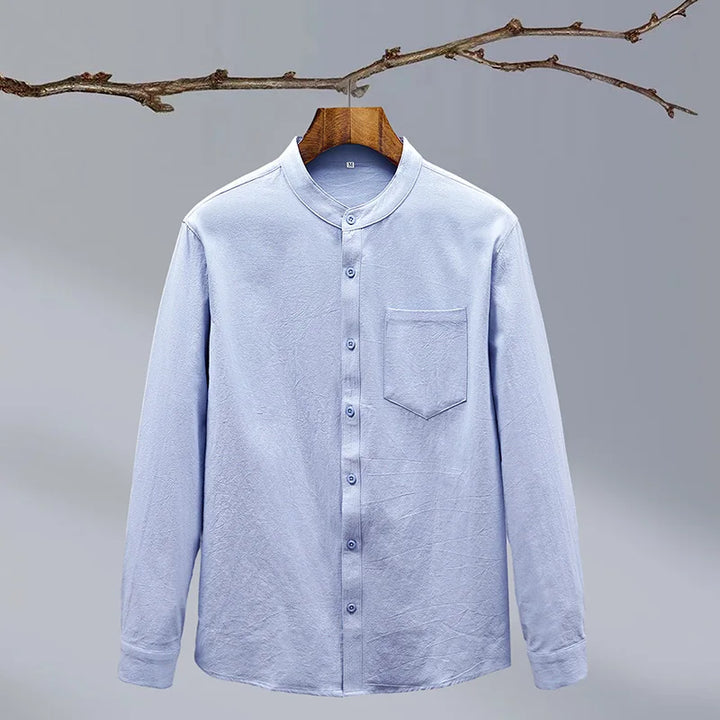 Versatile men's long-sleeve button-up top, designed with a tailored fit for modern men's fashion.
