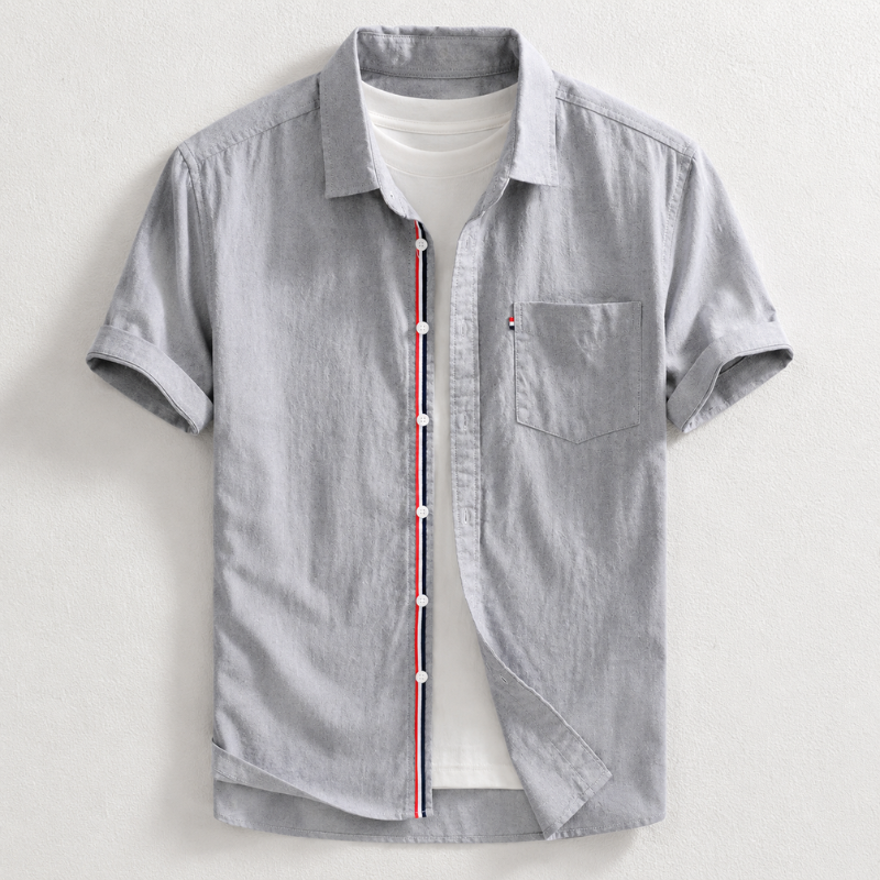 Versatile men's tailored fit Oxford shirt, a smart casual office wear essential. Classic long sleeve menswear style.