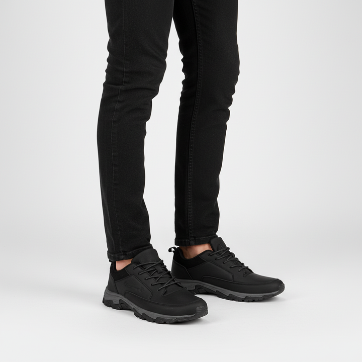 Stylish men's black leather lace-up dress shoes, side profile showcasing comfort and classic design