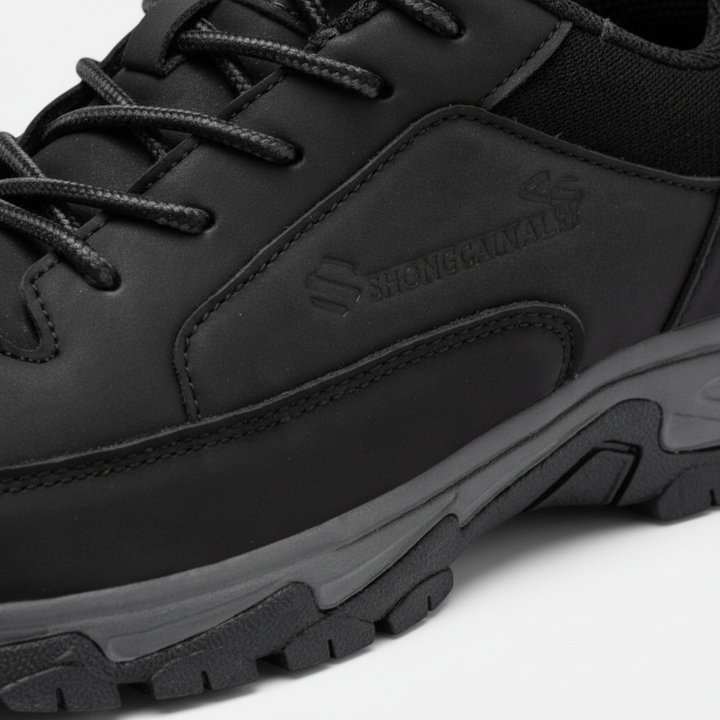 Close-up of Victor men's brown leather lace-up shoes, highlighting breathable material and quality stitching