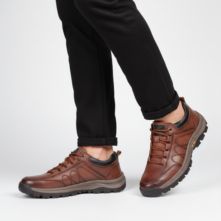 Pair of versatile men's leather lace-up casual shoes in dark brown, ideal for autumn-winter fashion.