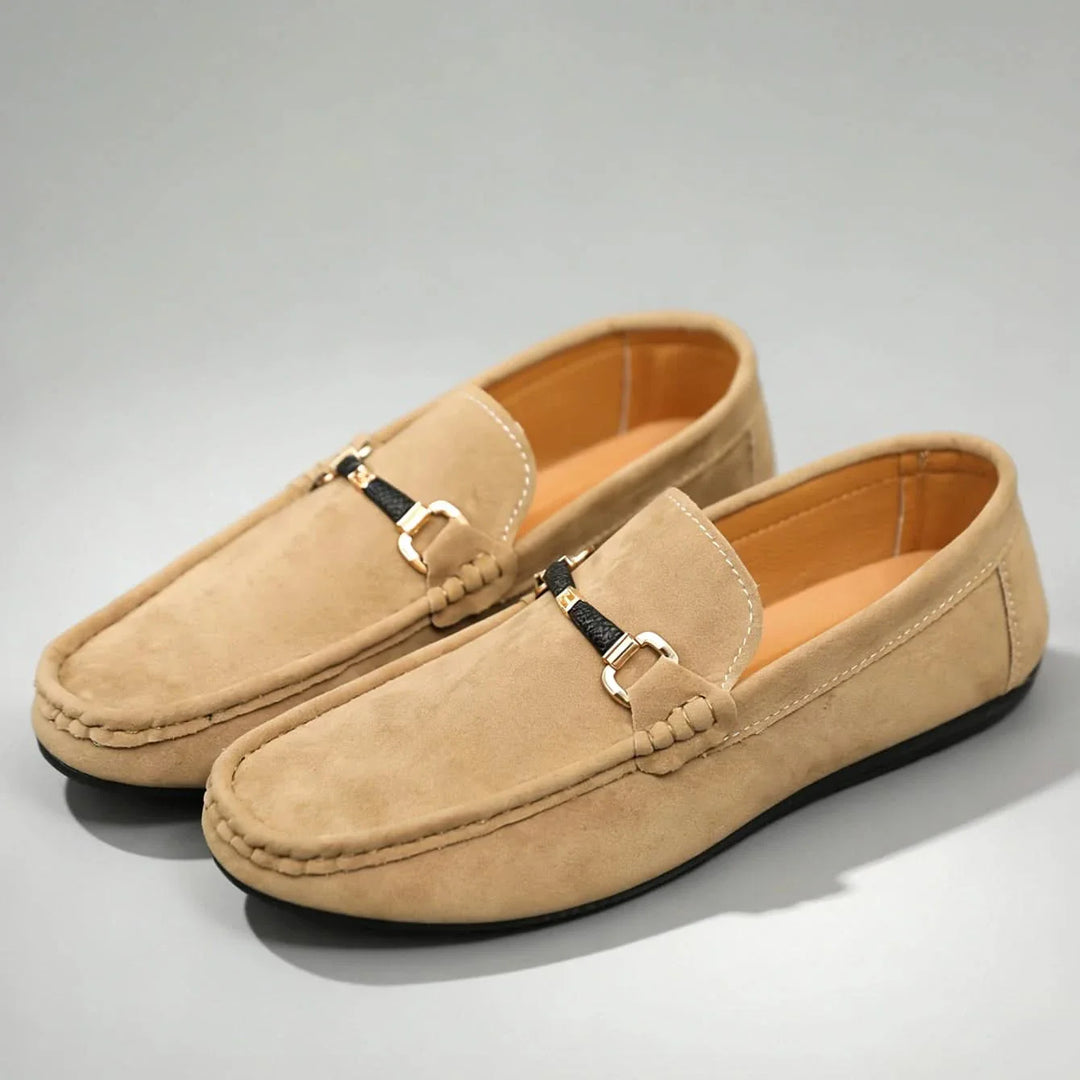 Men's classic tan slip-on loafers, perfect for everyday comfort and versatile casual or dress wear.