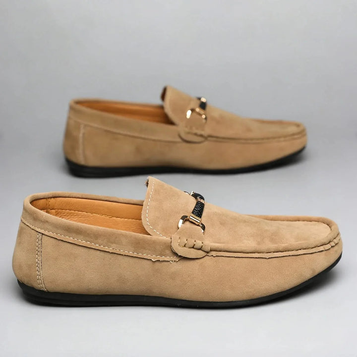 Stylish black men's slip-on loafers, offering ultimate comfort for both casual outings and office wear.