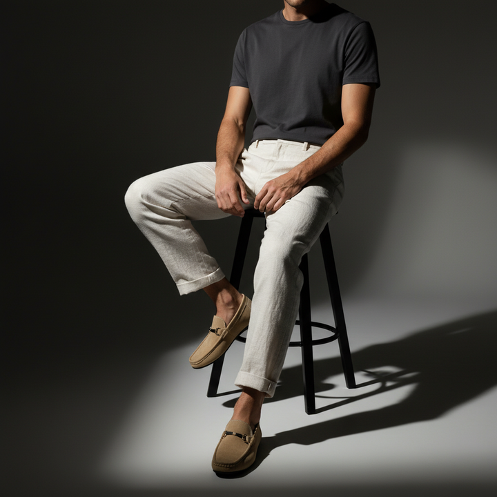Pair of men's tan slip-on loafers for everyday wear, combining classic style with supreme comfort and ease.