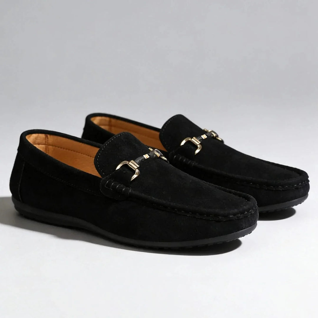 Front view of men's versatile slip-on loafers in black, suitable as comfortable casual or sophisticated dress footwear.