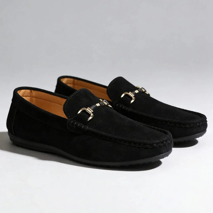 Front view of men's versatile slip-on loafers in black, suitable as comfortable casual or sophisticated dress footwear.
