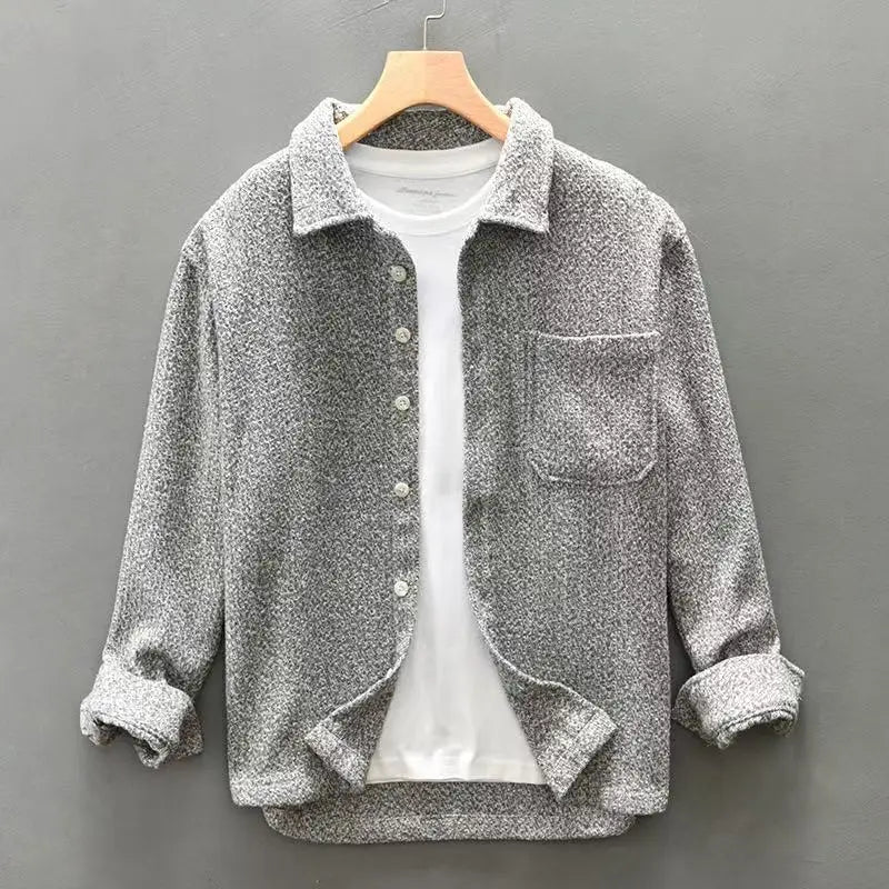 Men's classic textured button-down shirt in a relaxed fit, perfect for casual or smart-casual wear. Long sleeve.